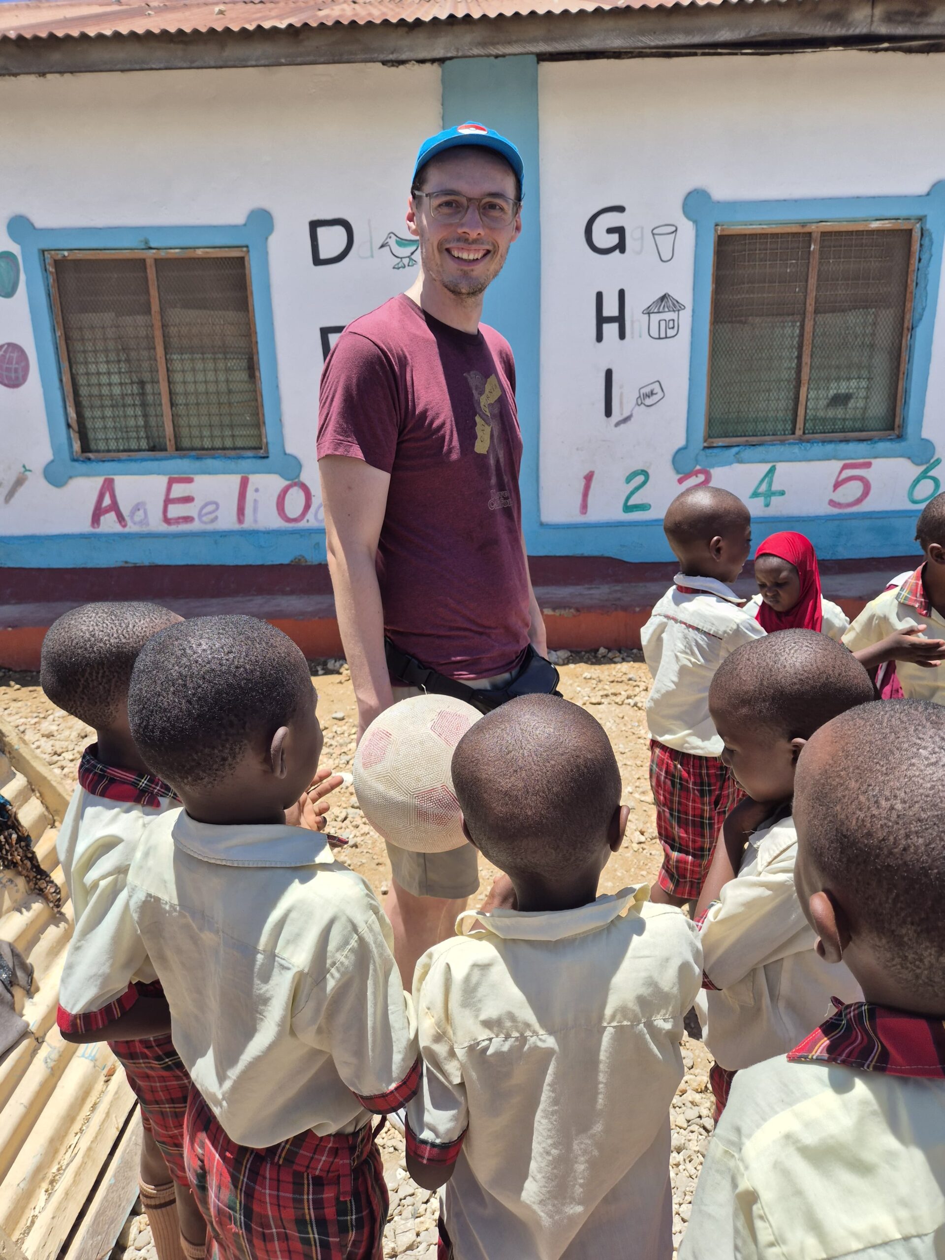 African kids with volunteer 