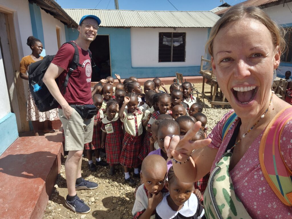 Kids and Volunteers in Africa at a school
