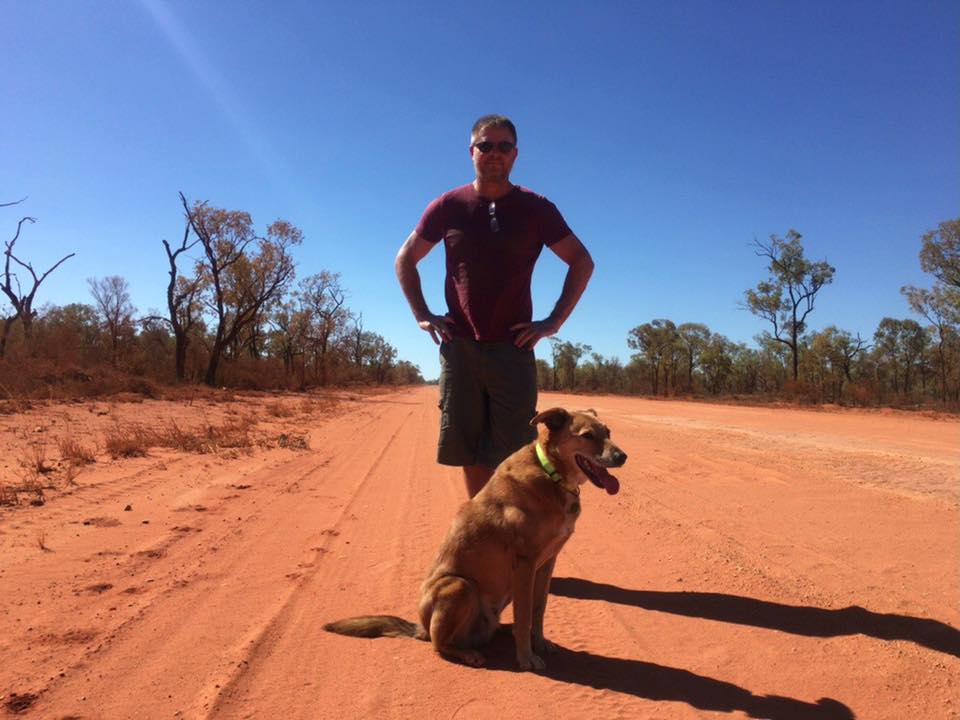 A man with his dog in Australia in the outback near longreach