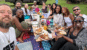 AfricaNomads all sitting around a table enjoying a meal