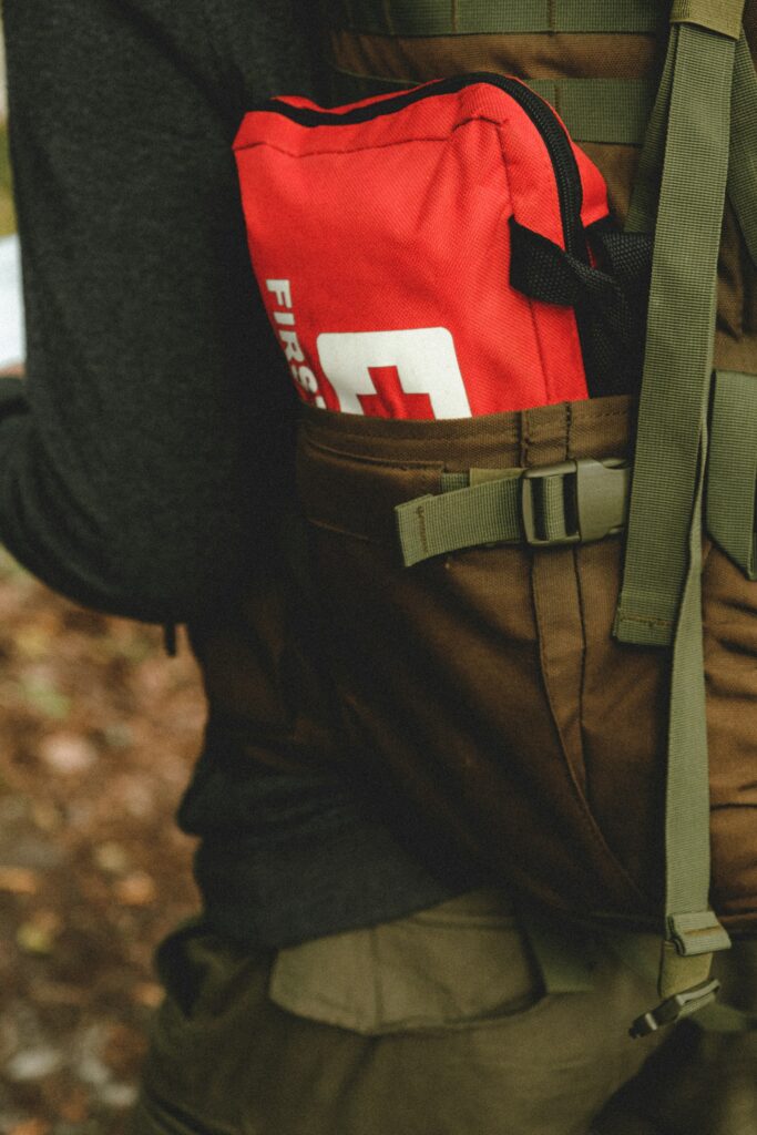 First aid kit in a pack in a cargo pant pocket