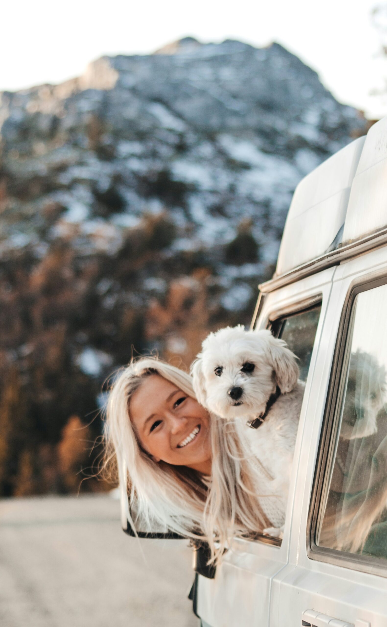 girl traveling with dog